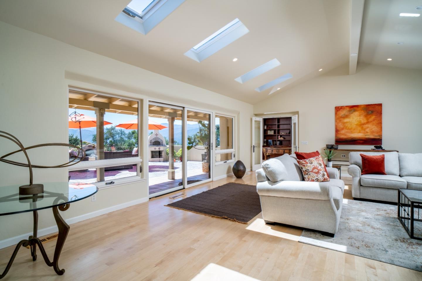 335 El Caminito Road Carmel Valley, CA 93924 - Photo 18 of 59 a living room with furniture and a large window