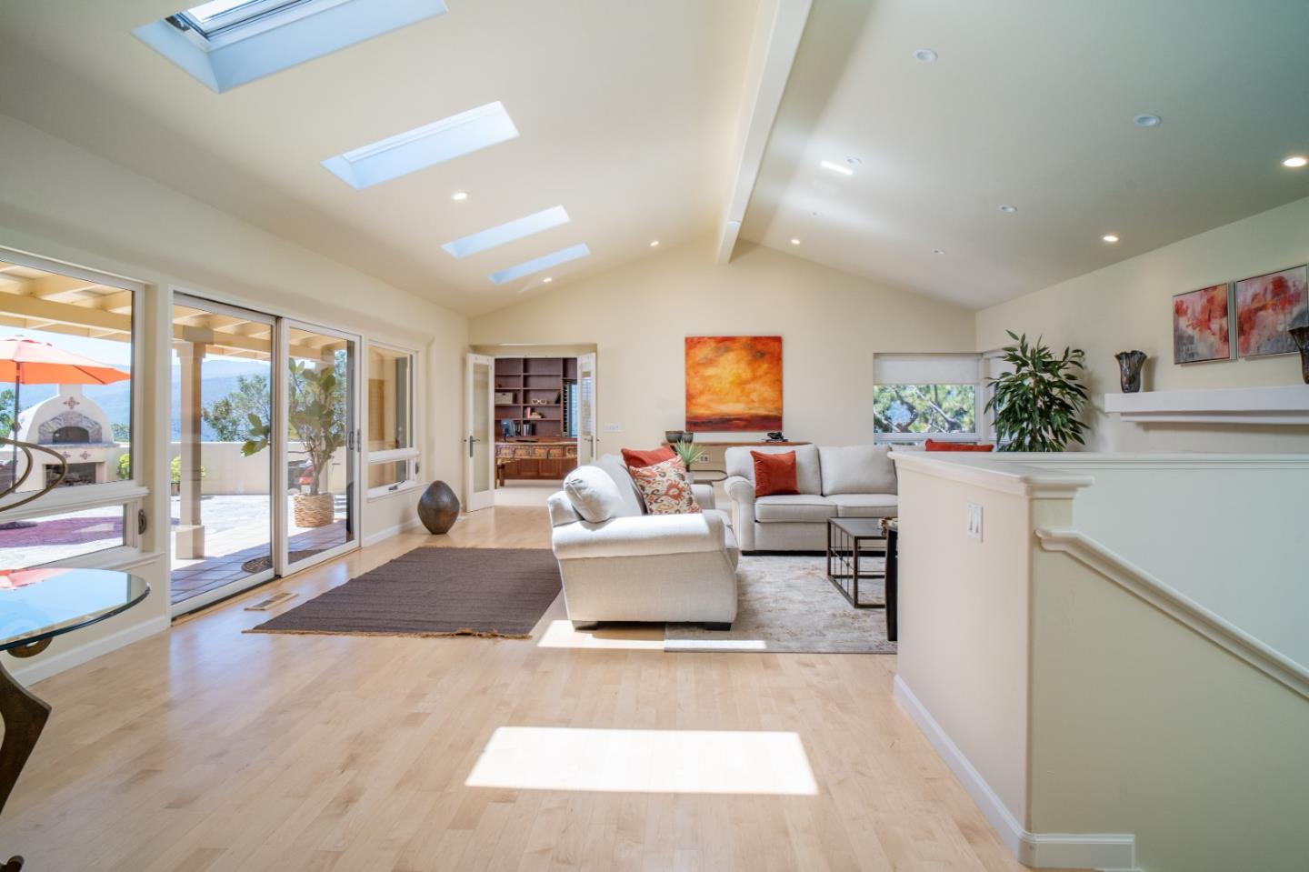 335 El Caminito Road Carmel Valley, CA 93924 - Photo 19 of 59 a living room with furniture and a large window