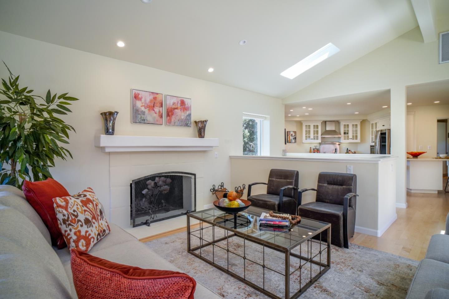 335 El Caminito Road Carmel Valley, CA 93924 - Photo 21 of 59 a living room with furniture and a fireplace