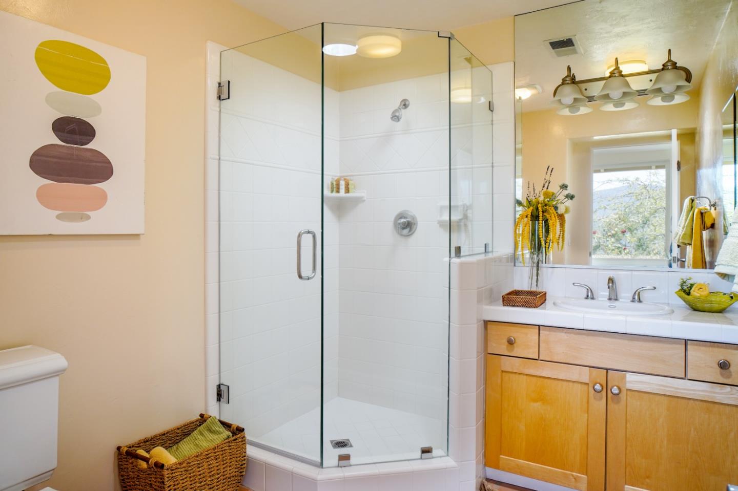 335 El Caminito Road Carmel Valley, CA 93924 - Photo 24 of 59 a bathroom with a sink mirror and shower