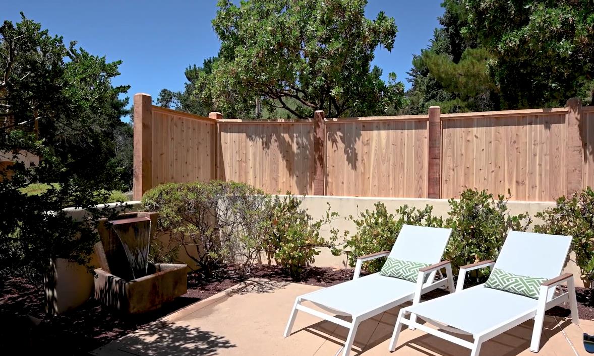 335 El Caminito Road Carmel Valley, CA 93924 - Photo 28 of 59 a view of a chairs and table in the backyard