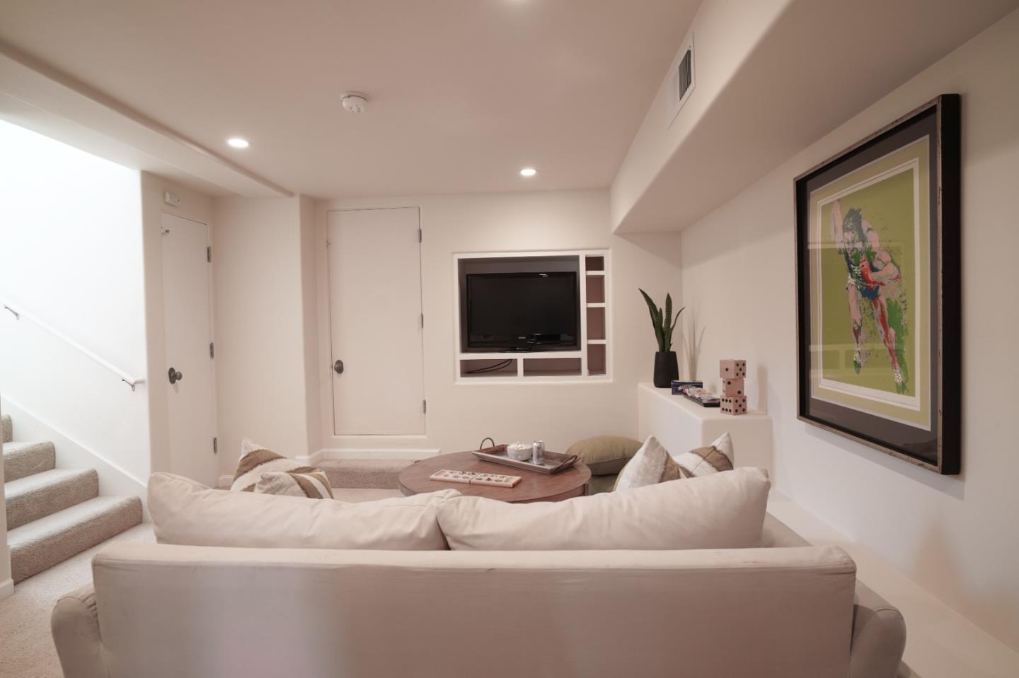 335 El Caminito Road Carmel Valley, CA 93924 - Photo 34 of 59 a living room with furniture and a flat screen tv