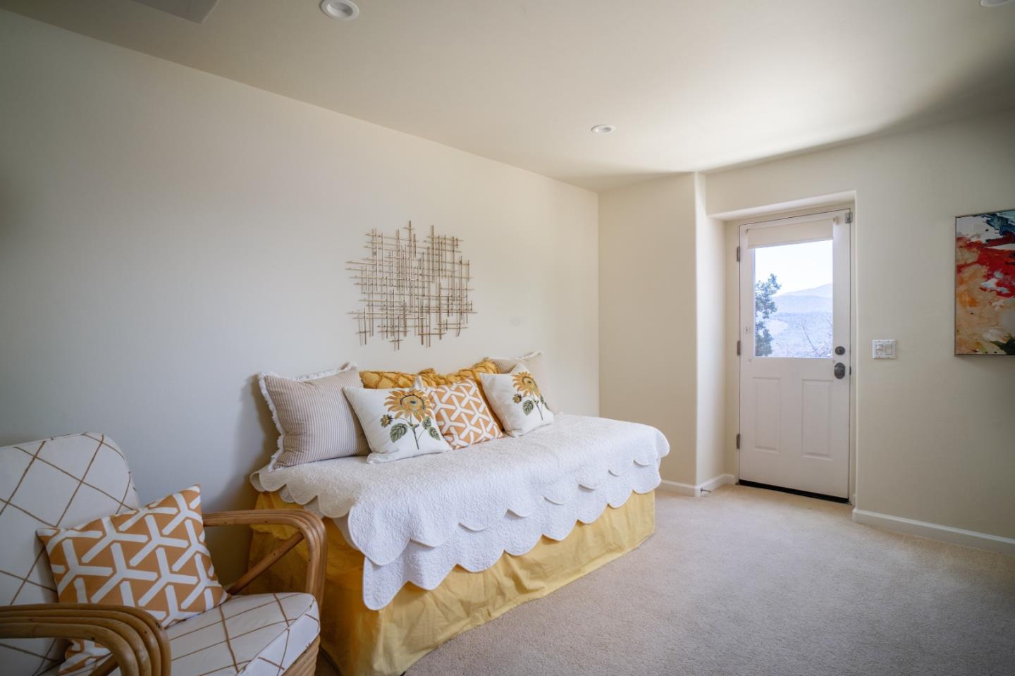 335 El Caminito Road Carmel Valley, CA 93924 - Photo 38 of 59 a bedroom with a bed and painting on the wall