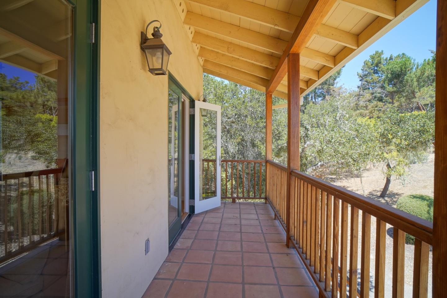 335 El Caminito Road Carmel Valley, CA 93924 - Photo 39 of 59 a view of a porch with wooden floor and outdoor space