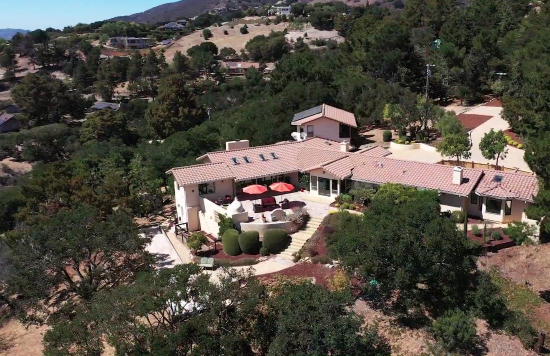 335 El Caminito Road Carmel Valley, CA 93924 - Photo 5 of 59 an aerial view of a house with a garden