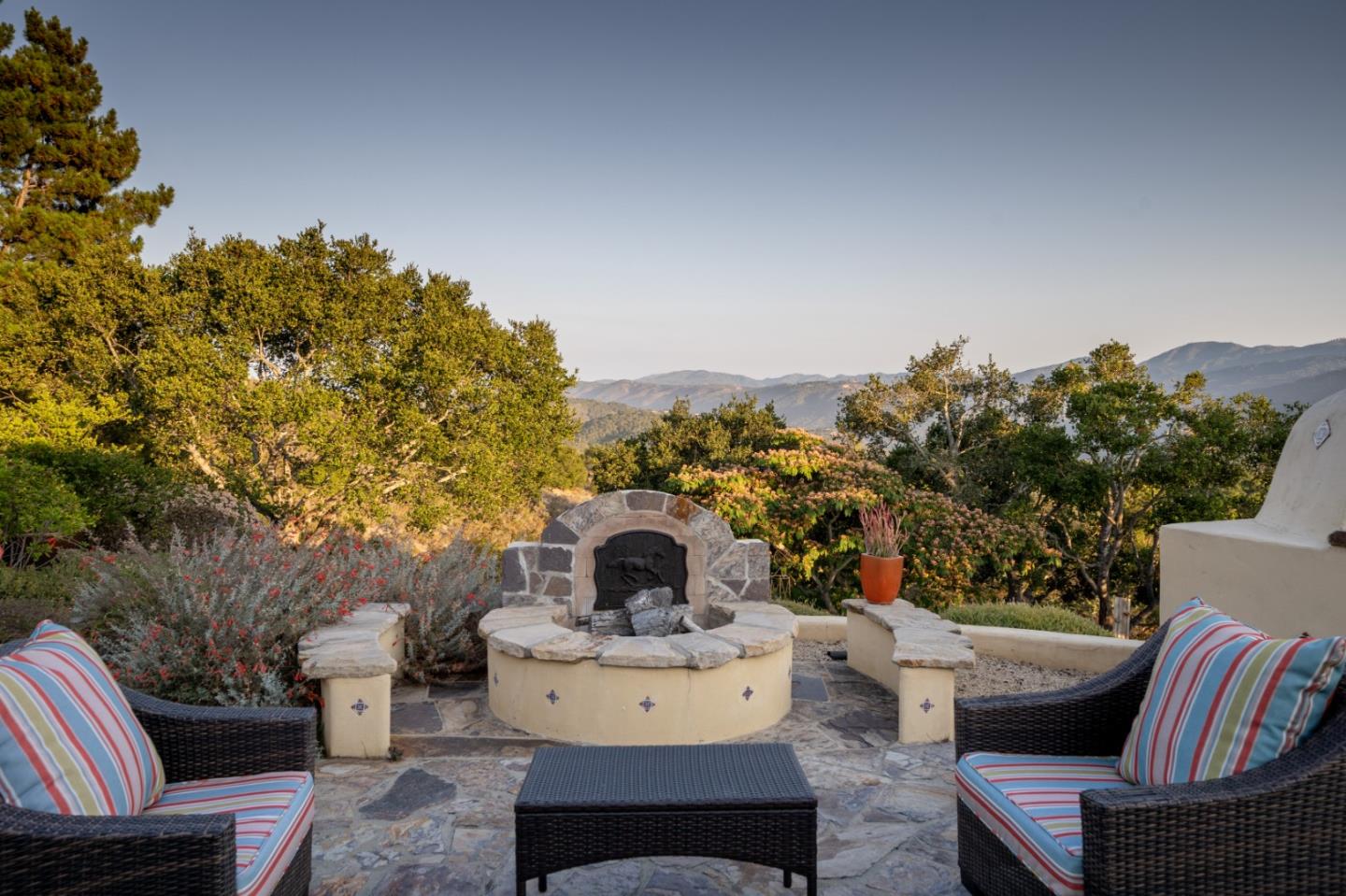 335 El Caminito Road Carmel Valley, CA 93924 - Photo 57 of 59 a view of a chairs and table in the living room