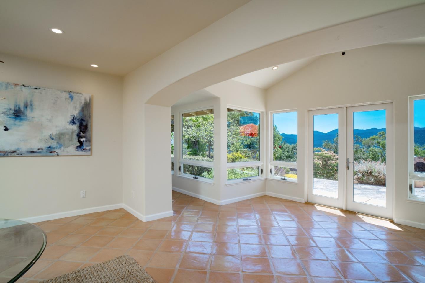 335 El Caminito Road Carmel Valley, CA 93924 - Photo 8 of 59 a view of an empty room with wooden floor and a window