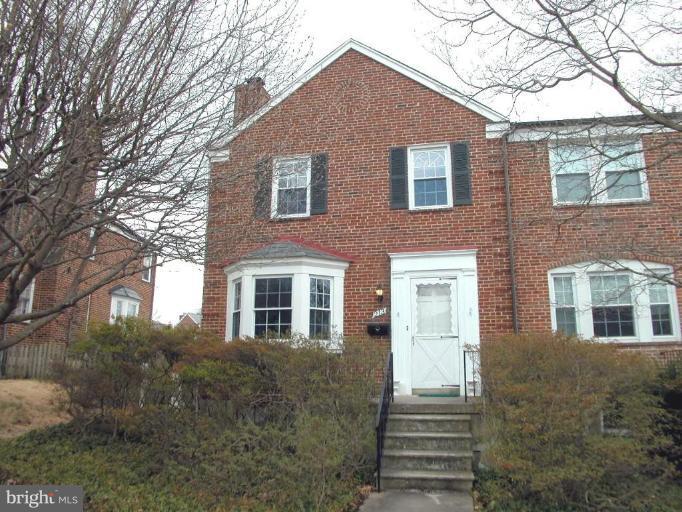 213 Blenheim Road Baltimore, MD 21212 - Photo 1 of 16 a front view of a house with a yard