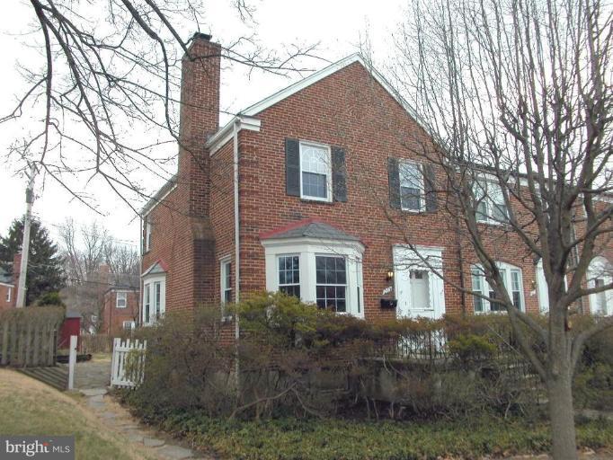 213 Blenheim Road Baltimore, MD 21212 - Photo 15 of 16 a front view of a house with a yard