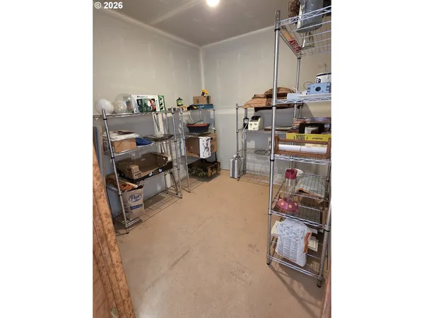 a dining room with furniture and a chandelier