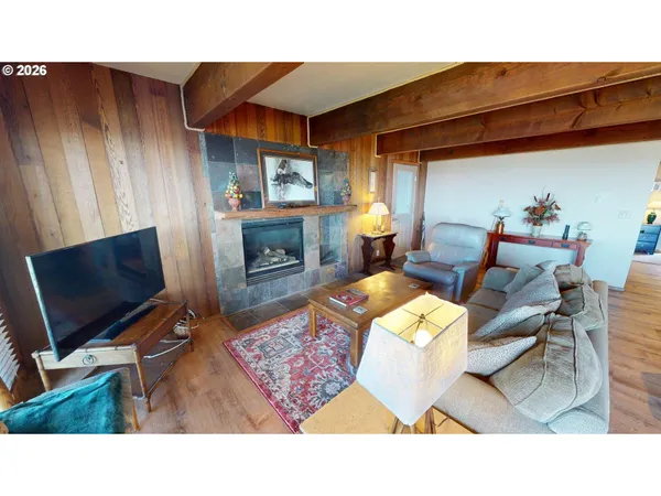 a bedroom with furniture and a fireplace