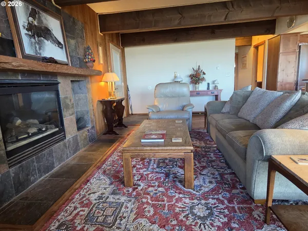 a bed in a room next to a mirror