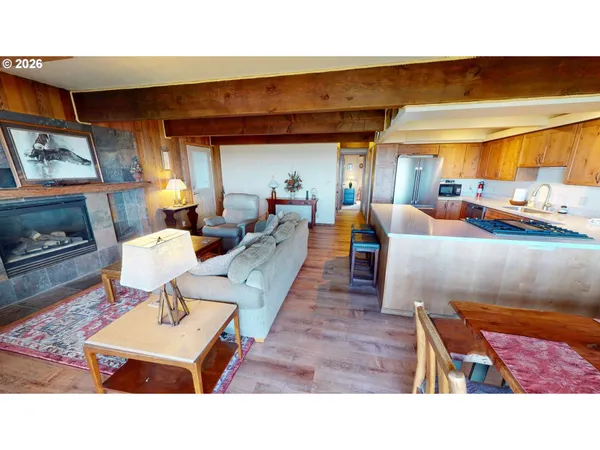 a living room with furniture and a table