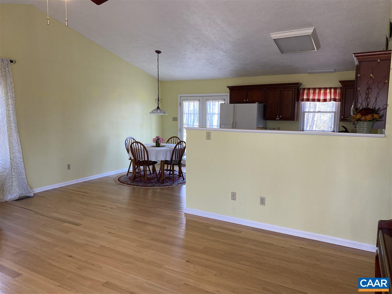 72 Tulip Road Ruckersville, VA 22968 - Photo 6 of 15 a view of a livingroom with furniture window and wooden floor