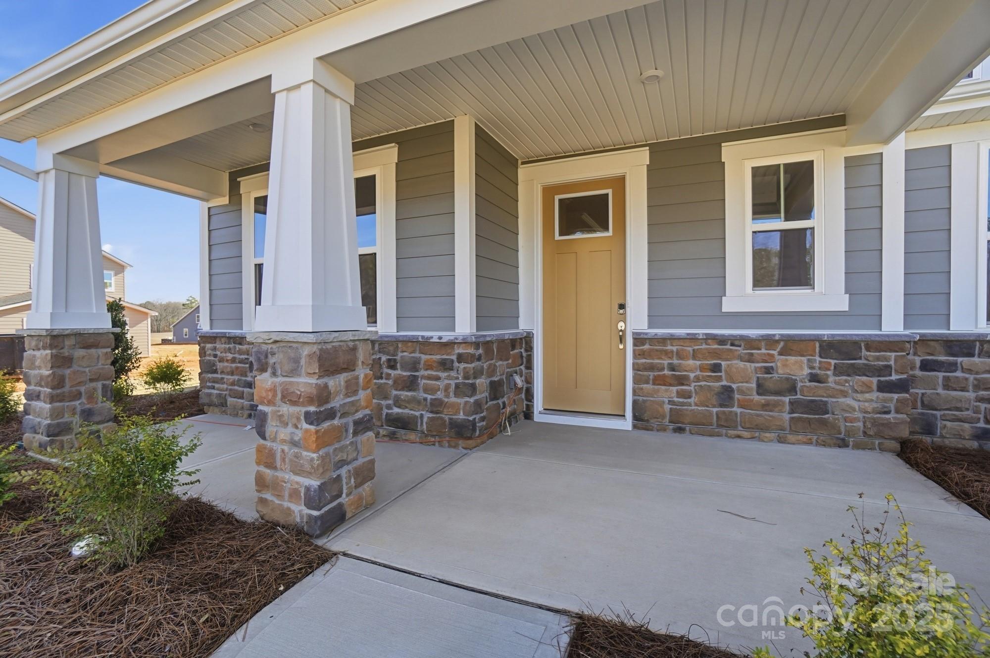 2526 Mabel Lane Monroe, NC 28110 - Photo 40 of 48 a view of a brick house with many windows