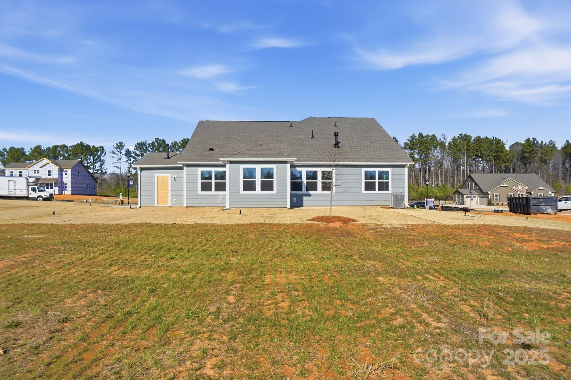 2526 Mabel Lane Monroe, NC 28110 - Photo 8 of 48 a front view of a house with a garden