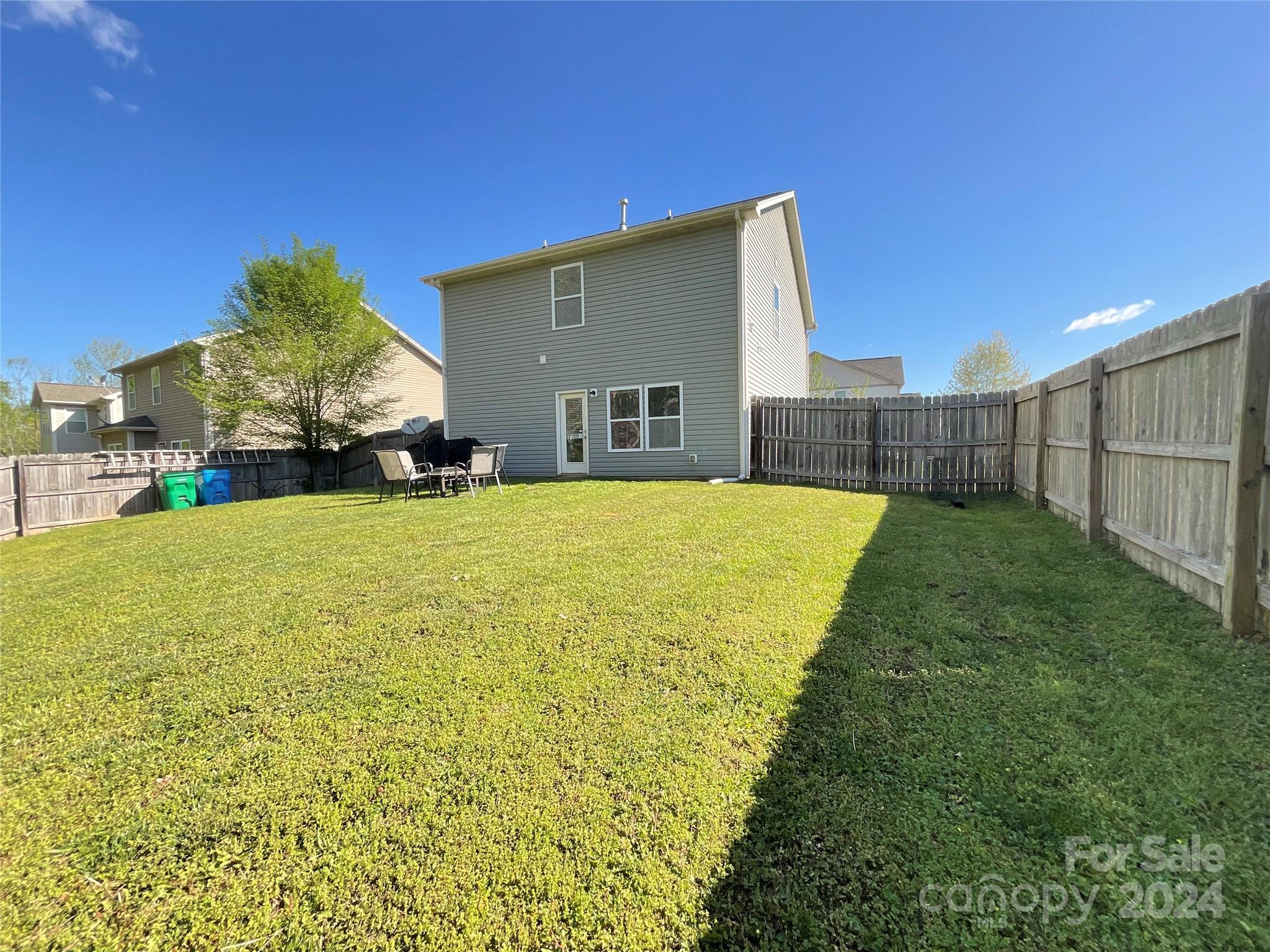 3271 Brickwood Circle Midland, NC 28107 - Photo 20 of 20 a view of a house with a yard and garage