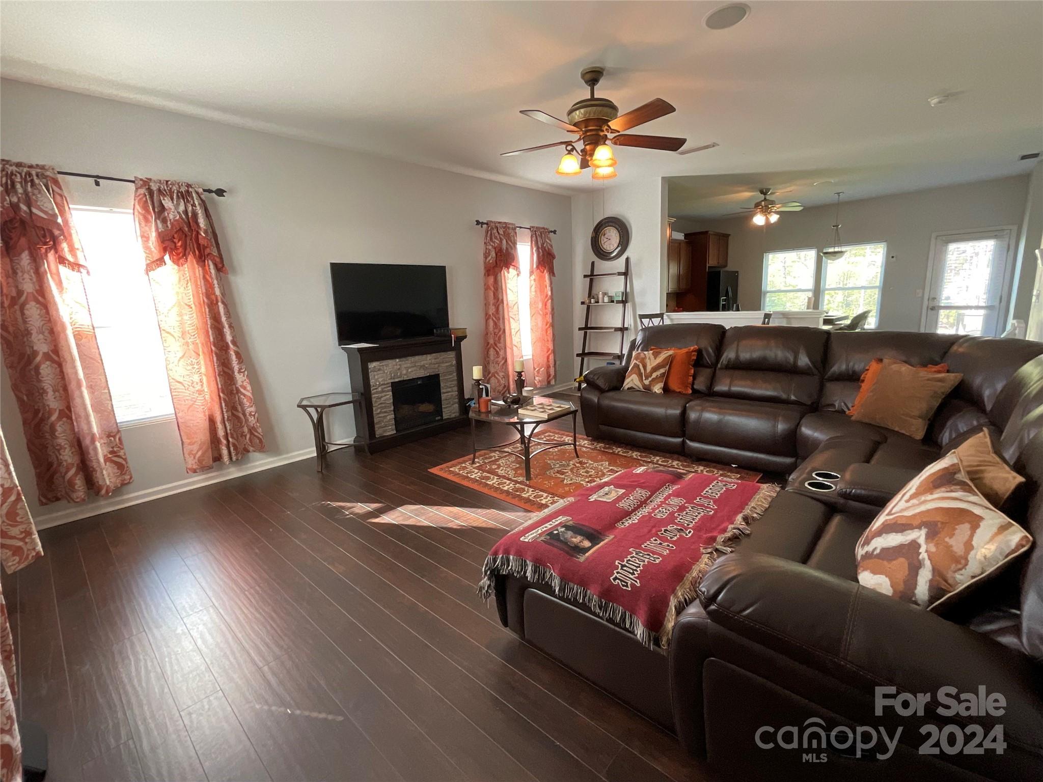 3271 Brickwood Circle Midland, NC 28107 - Photo 4 of 20 a living room with furniture and a flat screen tv