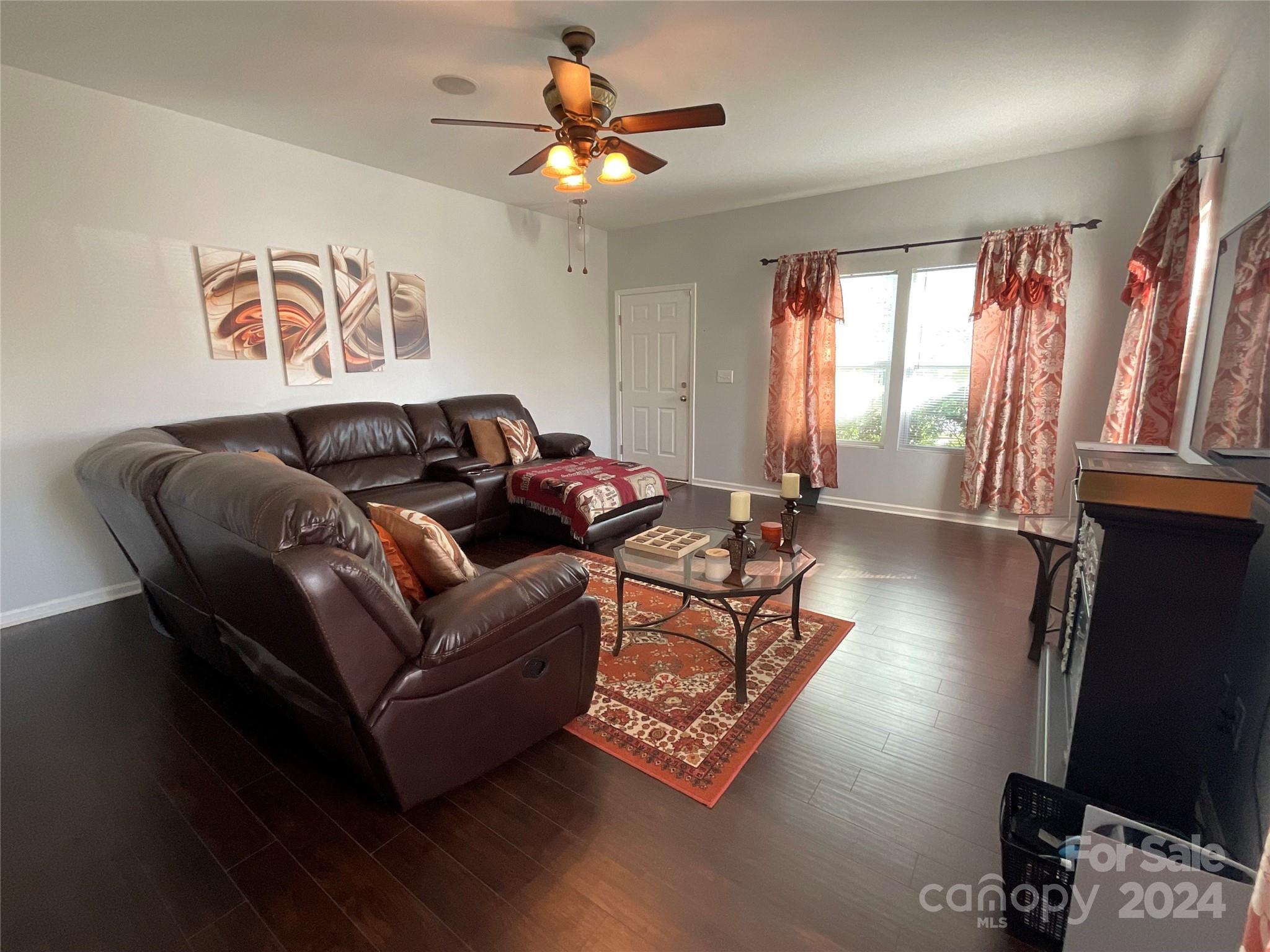 3271 Brickwood Circle Midland, NC 28107 - Photo 5 of 20 a living room with furniture window and wooden floor