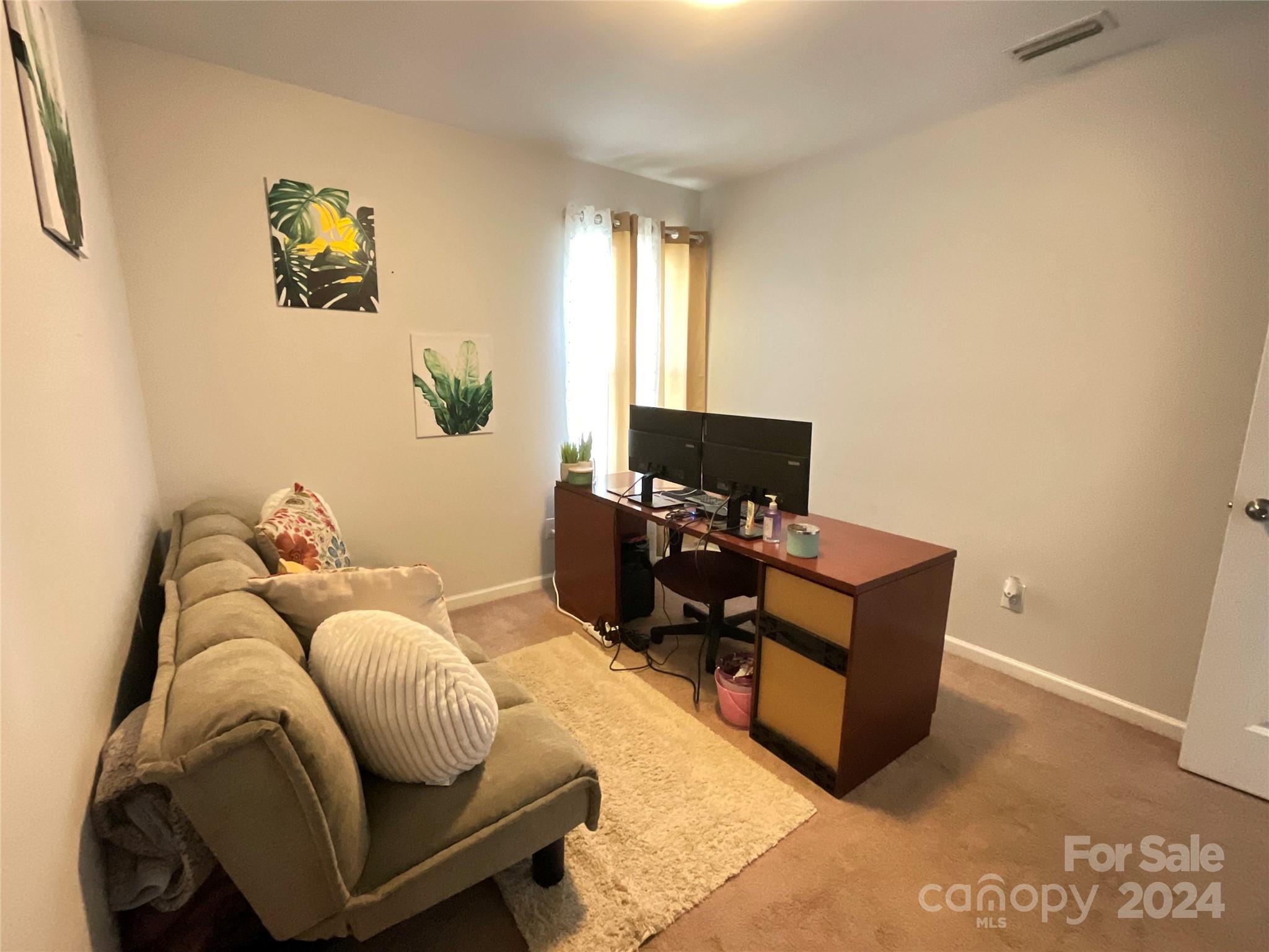 3271 Brickwood Circle Midland, NC 28107 - Photo 9 of 20 a living room with furniture and a window