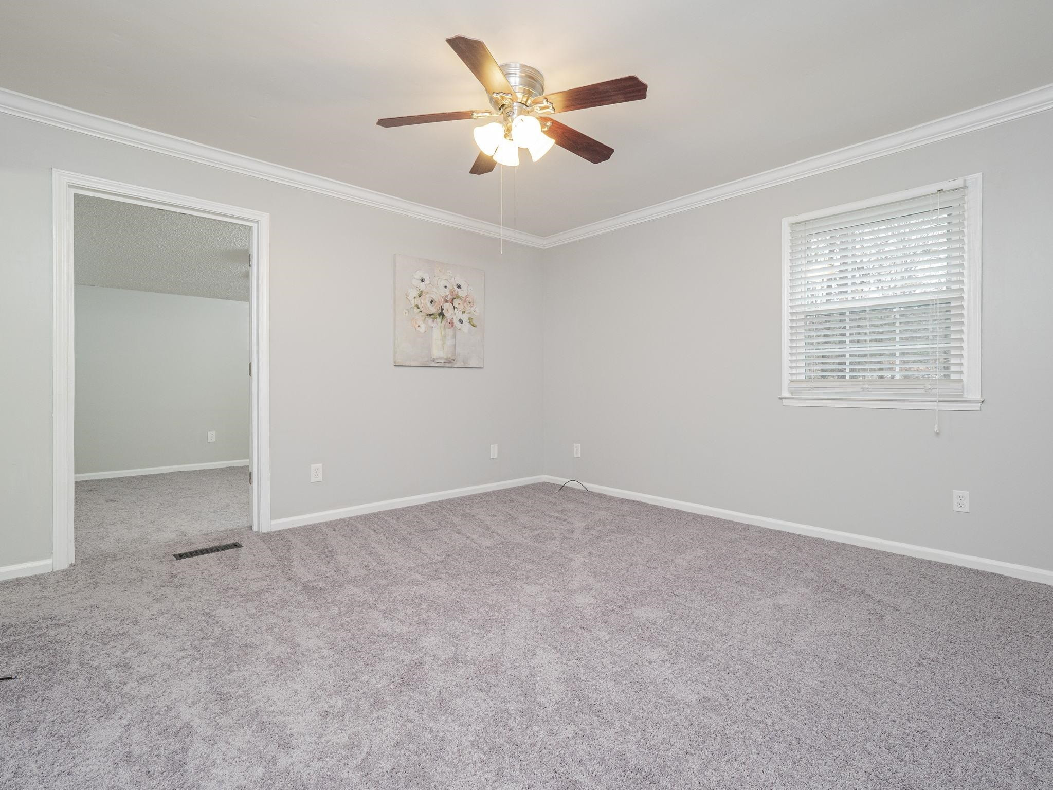5913 Pine Tree Court Raleigh, NC 27609 - Photo 10 of 19 Generously sized Owner's Suite with NEW CARPET! Additional doorway leads to a SITTING ROOM/ANOTHER FLEX/BONUS AREA! Owner's Suite