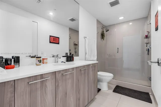 a view of city with tall buildings