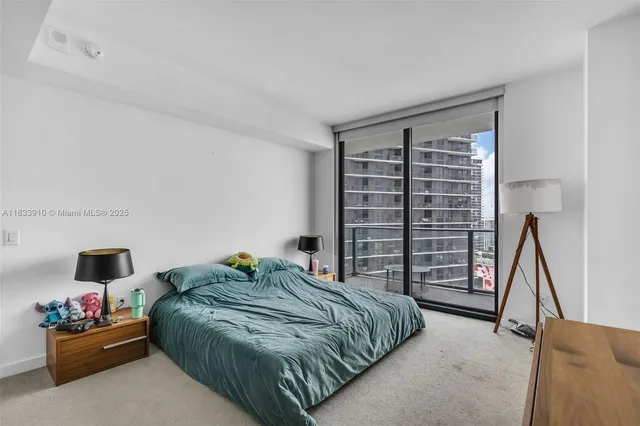 a view of a balcony with sitting area