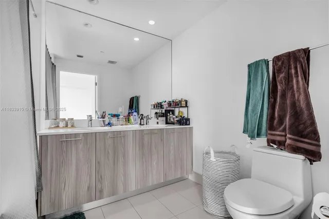 a front view of building with outdoor space and ocean view