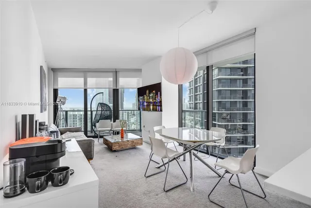 a room with gym equipment and a large window