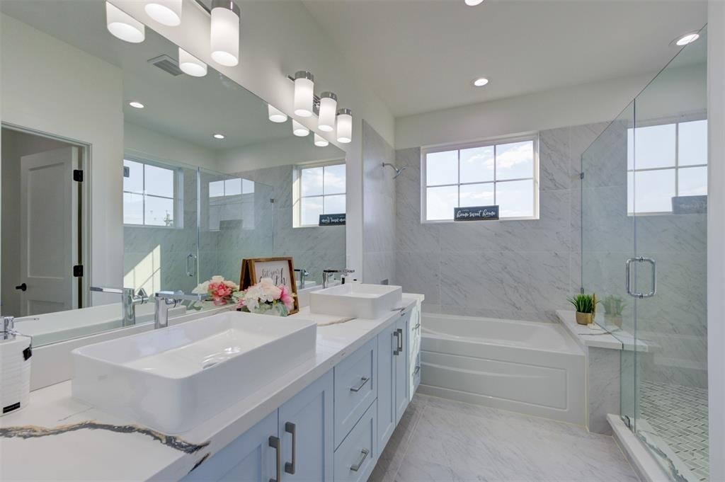 3412 Dixie Drive Houston, TX 77021 - Photo 13 of 15 a bathroom with a sink double vanity granite tub and a mirror