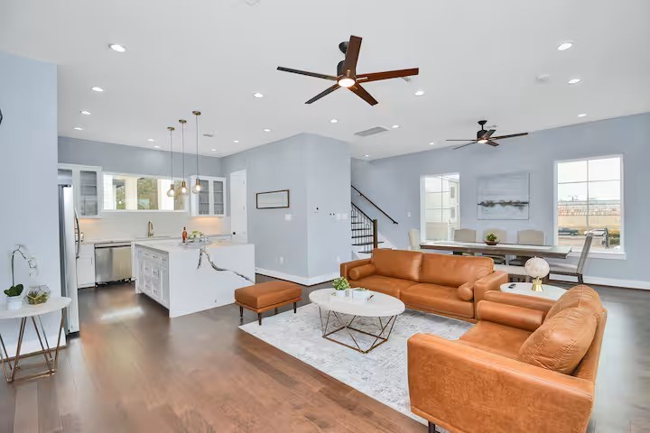 3412 Dixie Drive Houston, TX 77021 - Photo 5 of 15 a living room with furniture kitchen view and a wooden floor