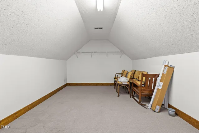 a stove top oven sitting inside of a kitchen