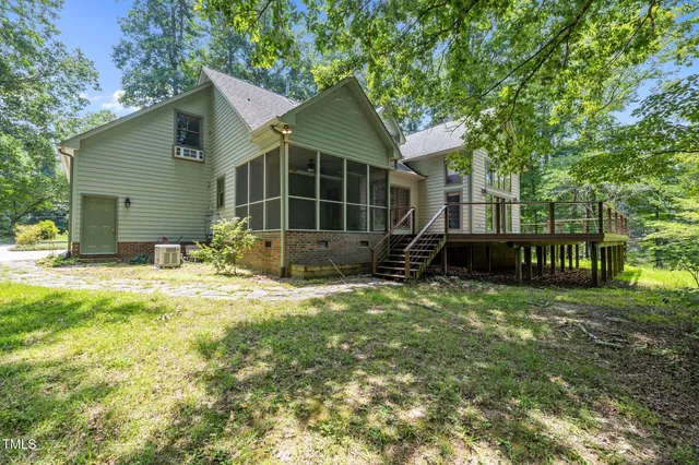 a view of a wooden door and wooden floor