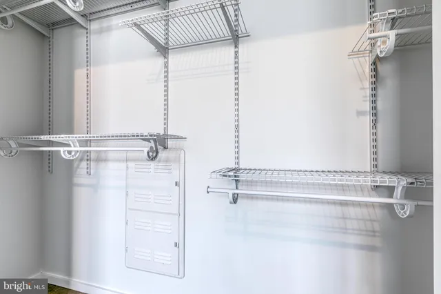 a view of a kitchen from the hallway