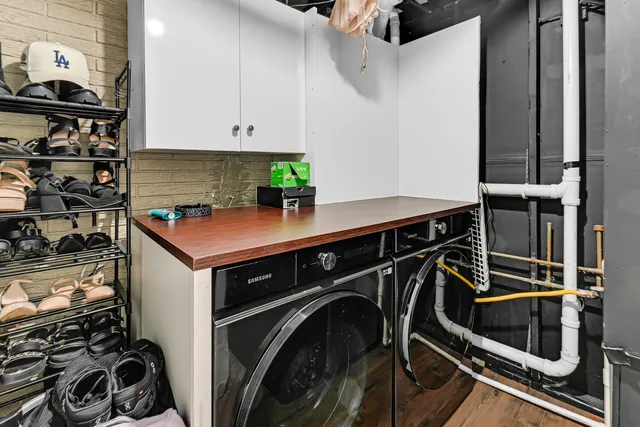 a utility room with dryer and washer