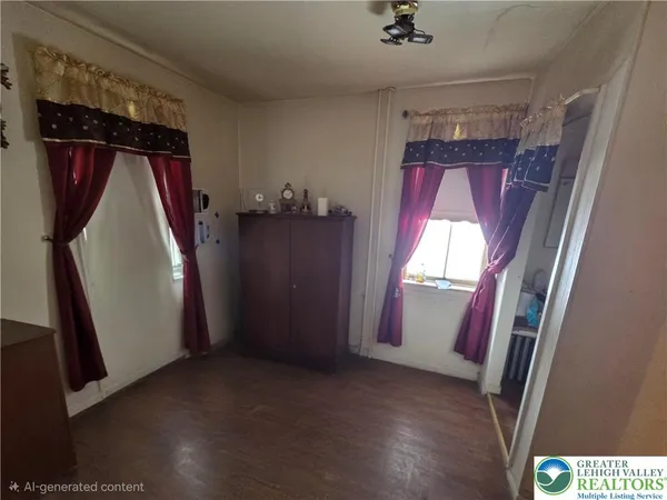 a bed room with a bed window and a chandelier