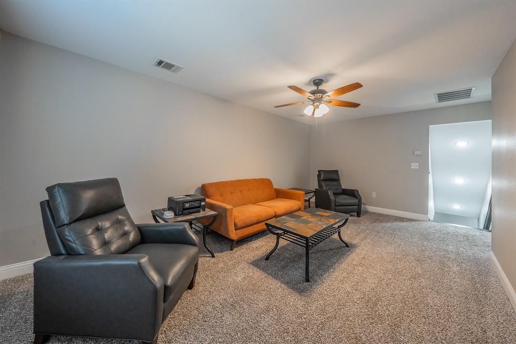 117 Rock Salt Drive Springtown, TX 76082 - Photo 28 of 38 Carpeted room with a ceiling fan, recessed lighting, and light gray wall paint