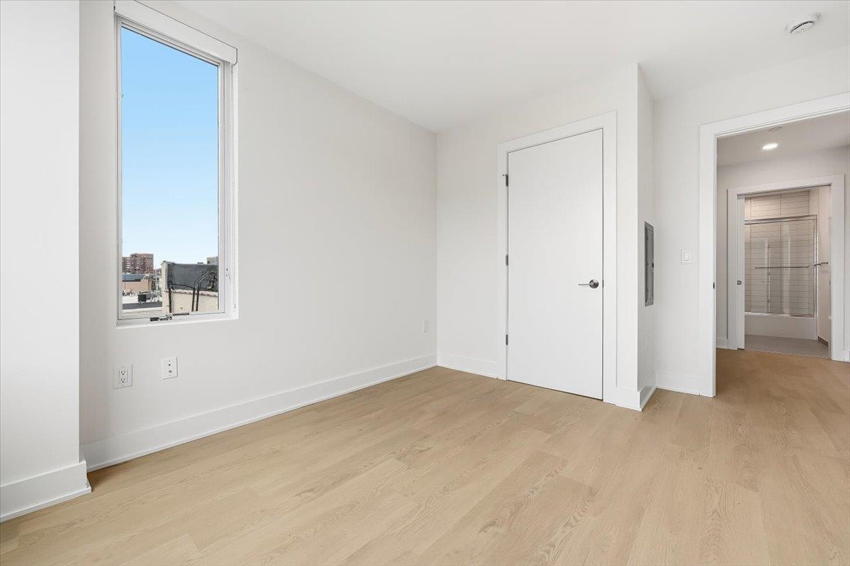 303 Madison Street, Unit 406 Hoboken, NJ 07030 - Photo 8 of 29 a view of an empty room with a window