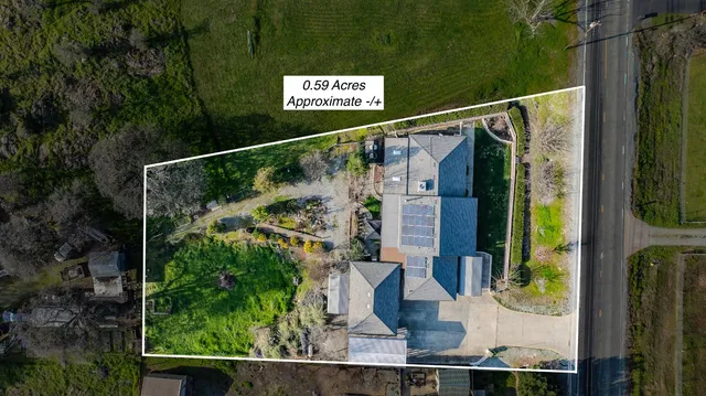 a view of a lake with a yard