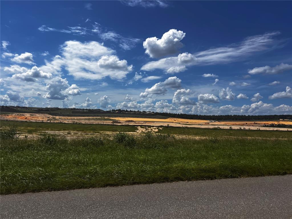 Sugarloaf Mountain Road Clermont, FL 34715 - Photo 9 of 22 a view of a lake from a yard