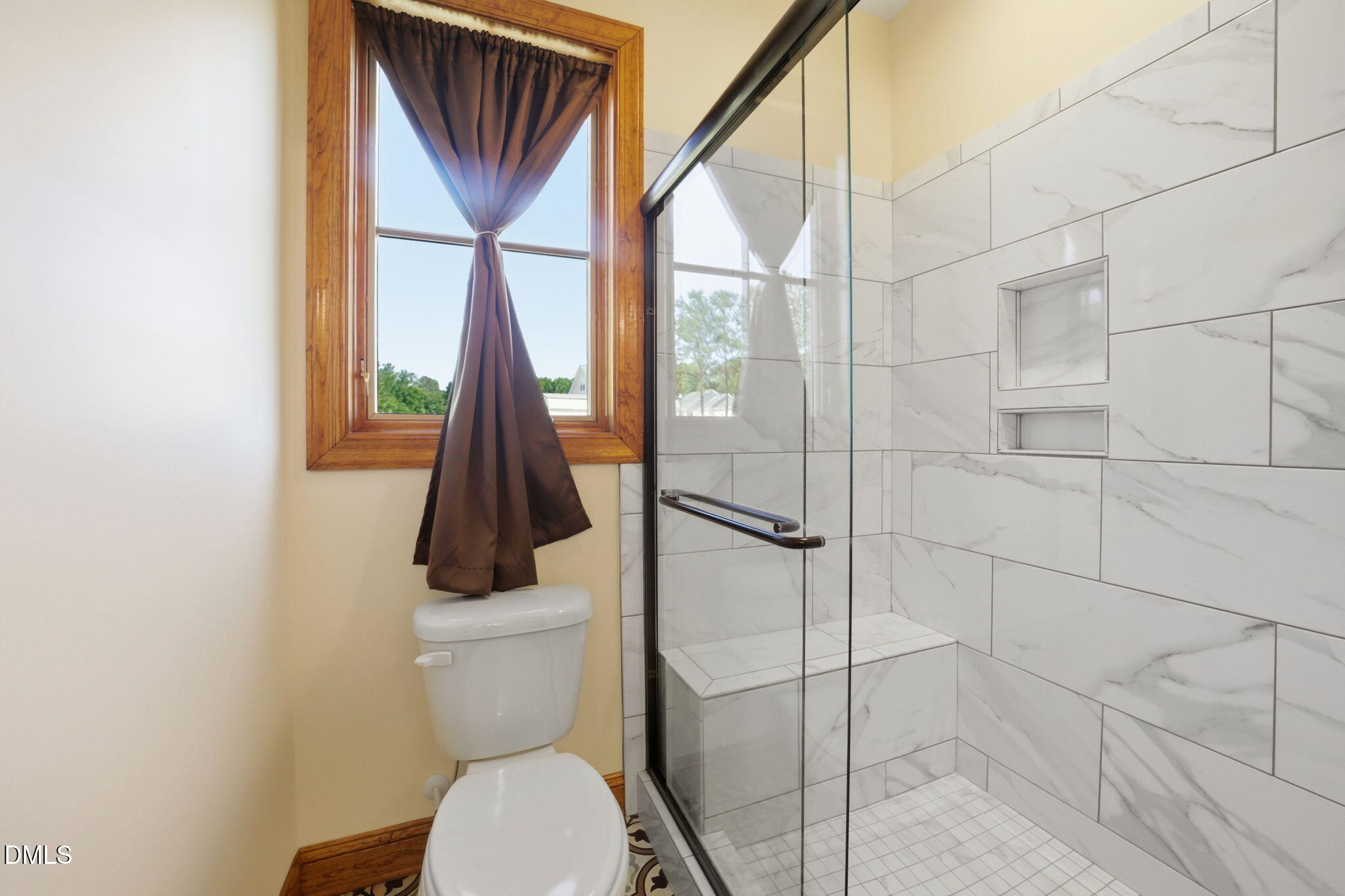 35 North Rippling Court Smithfield, NC 27577 - Photo 35 of 59 a bathroom with a toilet and a shower