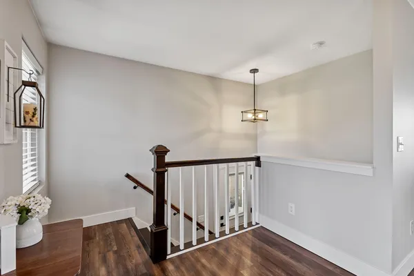 a view of a lake with a building in the background