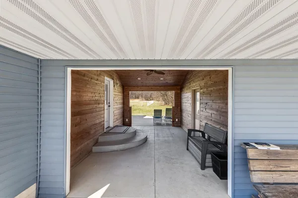 a kitchen with stainless steel appliances granite countertop a stove and cabinets