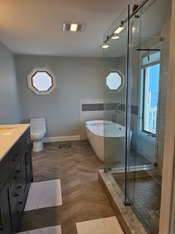 a bathroom with a sink and mirror