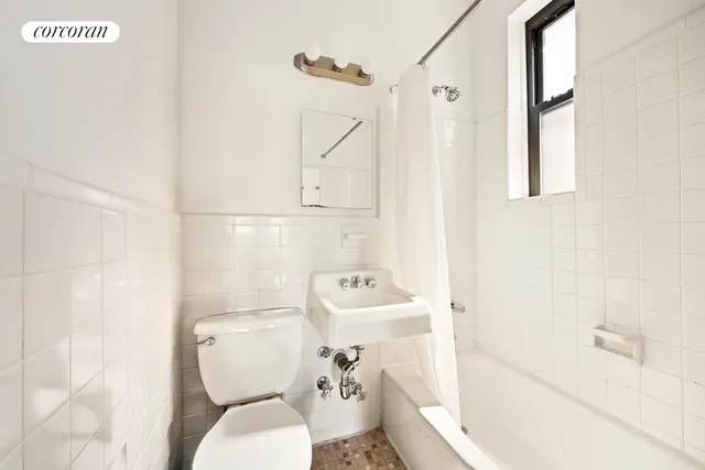 a white refrigerator freezer sitting inside of a kitchen
