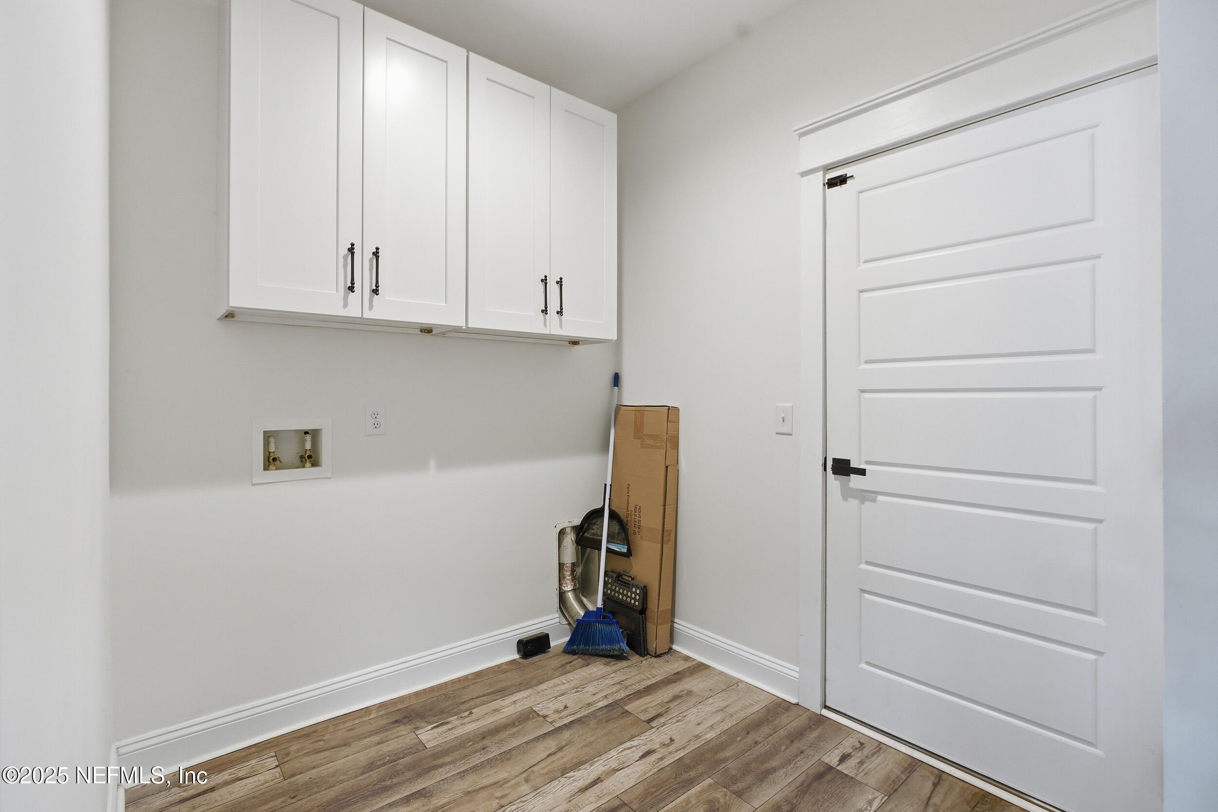128 Santa Rosa Street Florahome, FL 32140 - Photo 22 of 57 a view of room with stairs and wooden floor