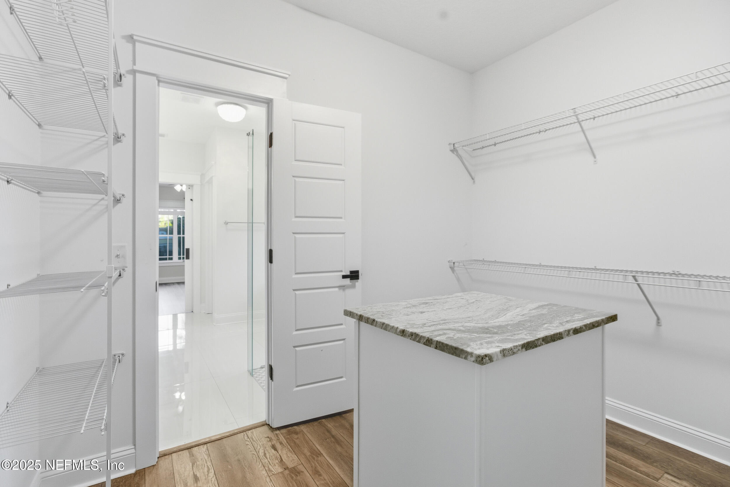 128 Santa Rosa Street Florahome, FL 32140 - Photo 33 of 57 a bathroom with a granite countertop sink and shower