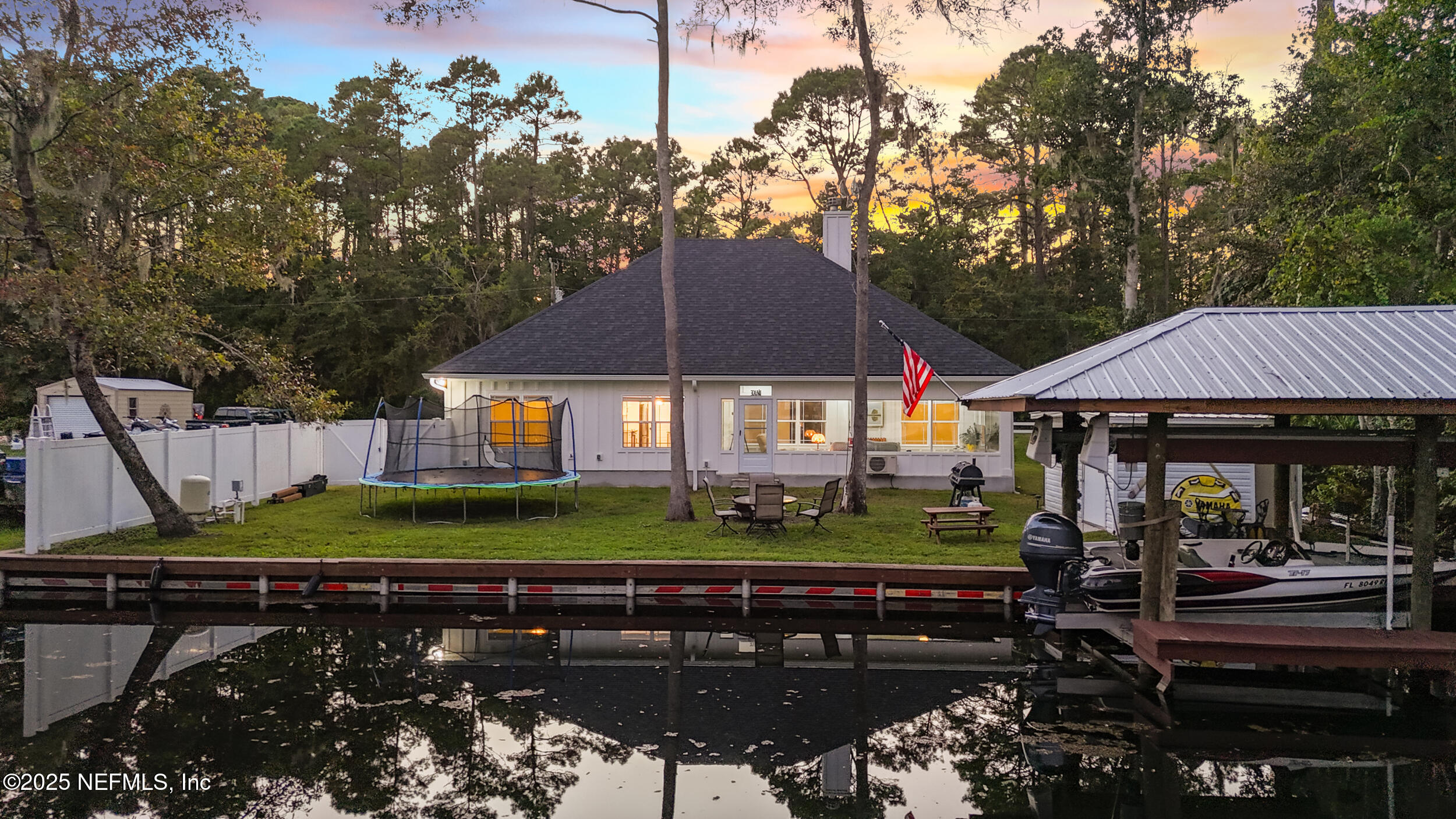 128 Santa Rosa Street Florahome, FL 32140 - Photo 48 of 57 a view of a house with a yard