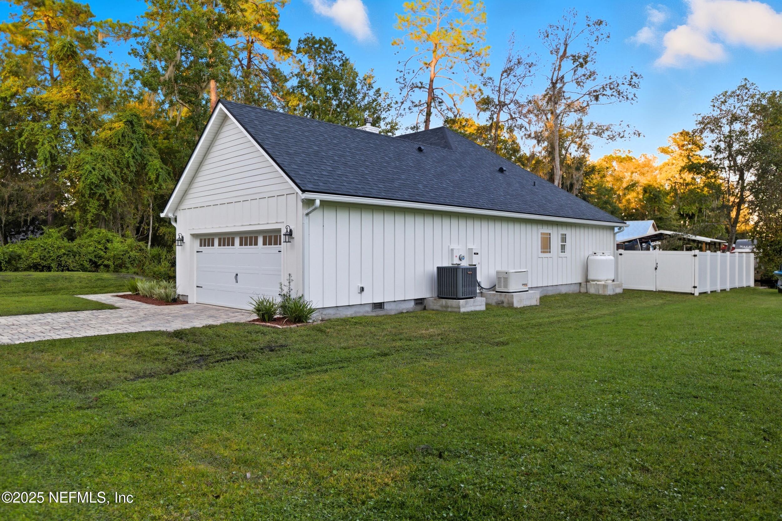 128 Santa Rosa Street Florahome, FL 32140 - Photo 51 of 57 a view of a back yard of the house