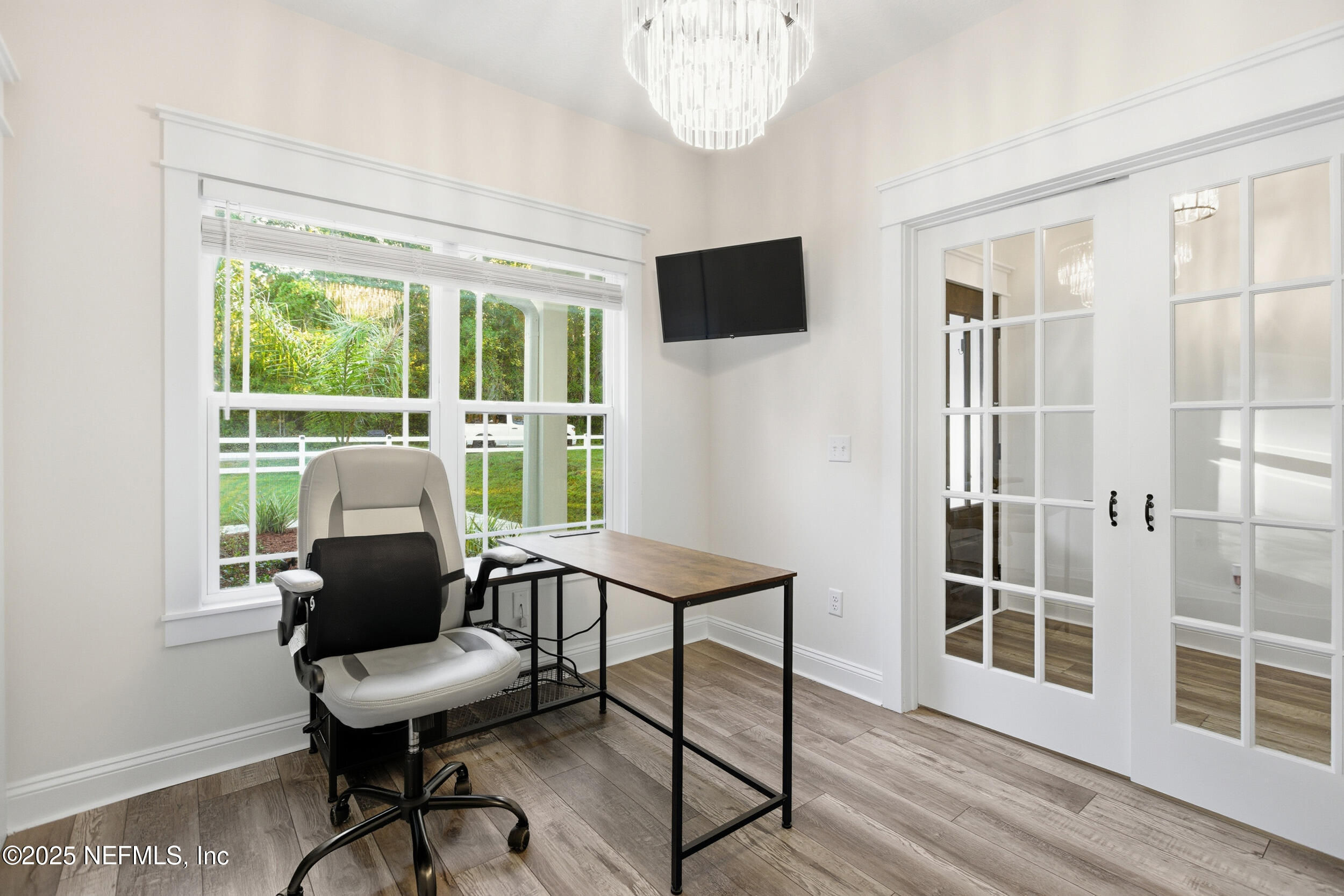 128 Santa Rosa Street Florahome, FL 32140 - Photo 6 of 57 a work room with furniture and a window